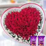 25 Red Roses in heart shape flower arrangement + 2 sillk