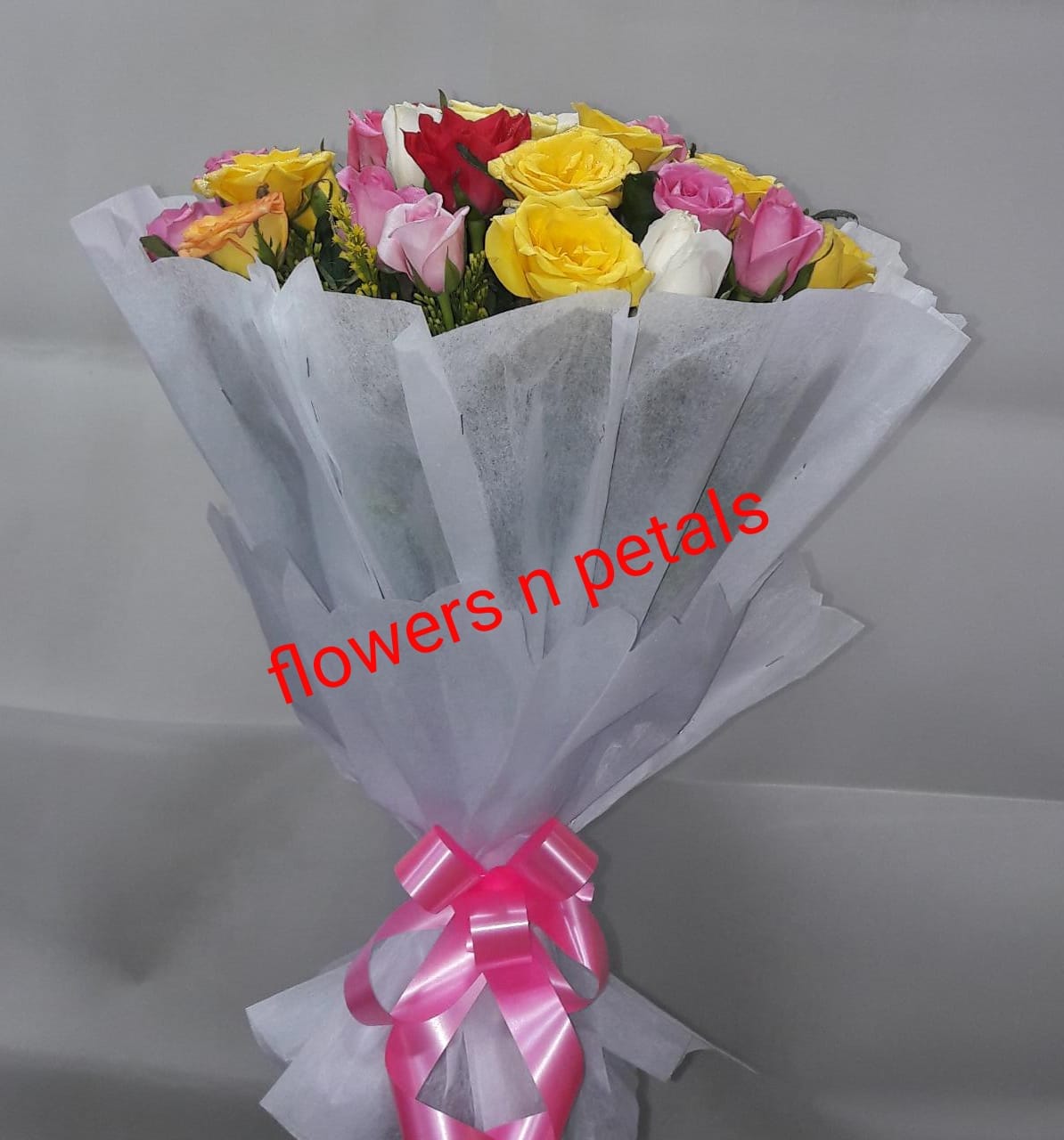 24 Multicolor Roses Hand Bunch With White Paper Packing