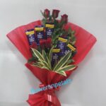 One Sided Hand Bunch with 6 red Roses 6 Dairy Milk Chocolate Red Paper Packing