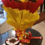 20 Red And Yellow Roses Bunch with Red And Yellow Paper Packing + 1/2 KG. Black Forest Cake