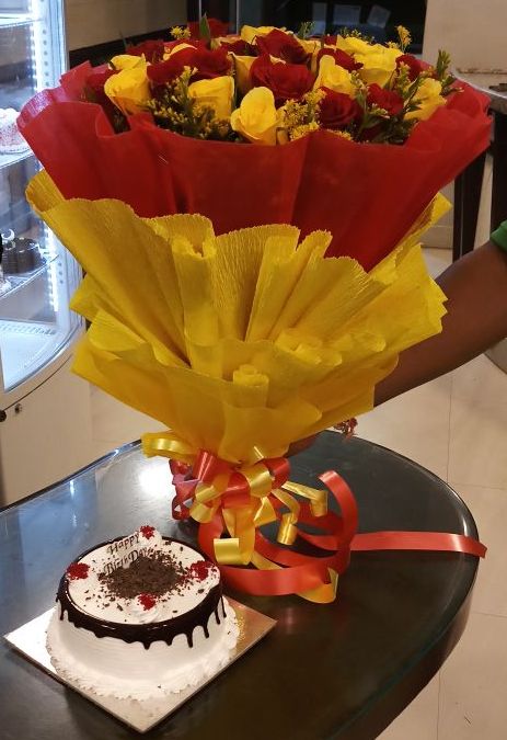 20 Red And Yellow Roses Bunch with Red And Yellow Paper Packing + 1/2 KG. Black Forest Cake