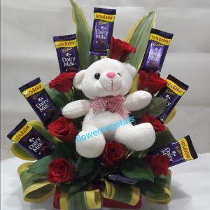 8 red roses + 8 Dairy Milk with 6" Teddy In one sided Arrangement